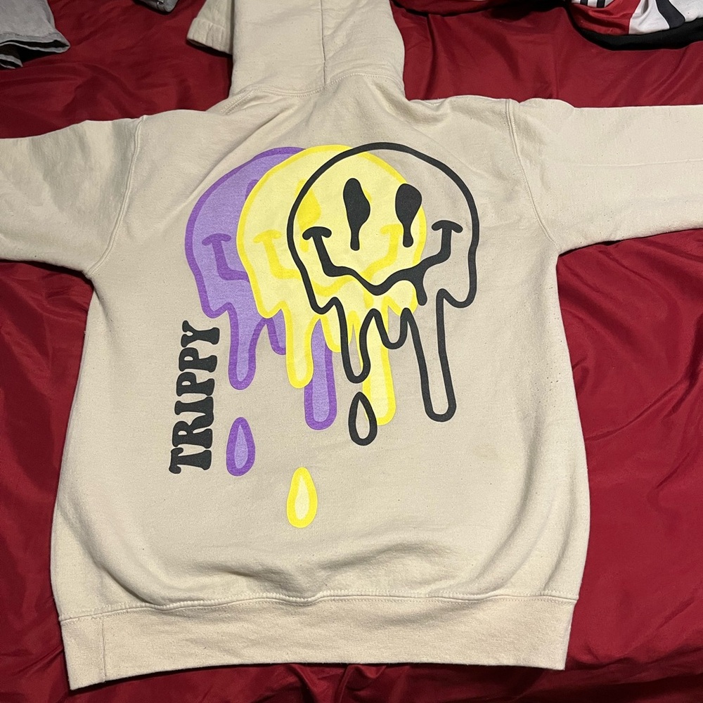 Trippy Cream Hoodie with Graphic Accents